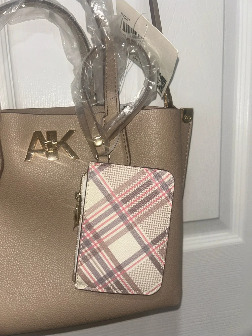 Anne Klein “Montana.” NWT Stone color. AKH4518. W/ coin purse.Turn lock in front